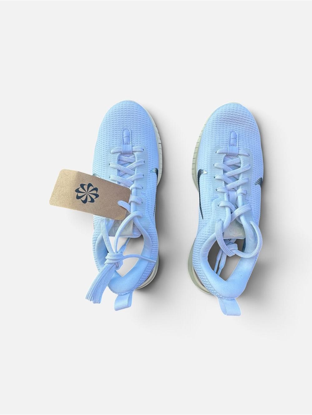 Nike Athletic Sneakers in cream  with Black Swoosh